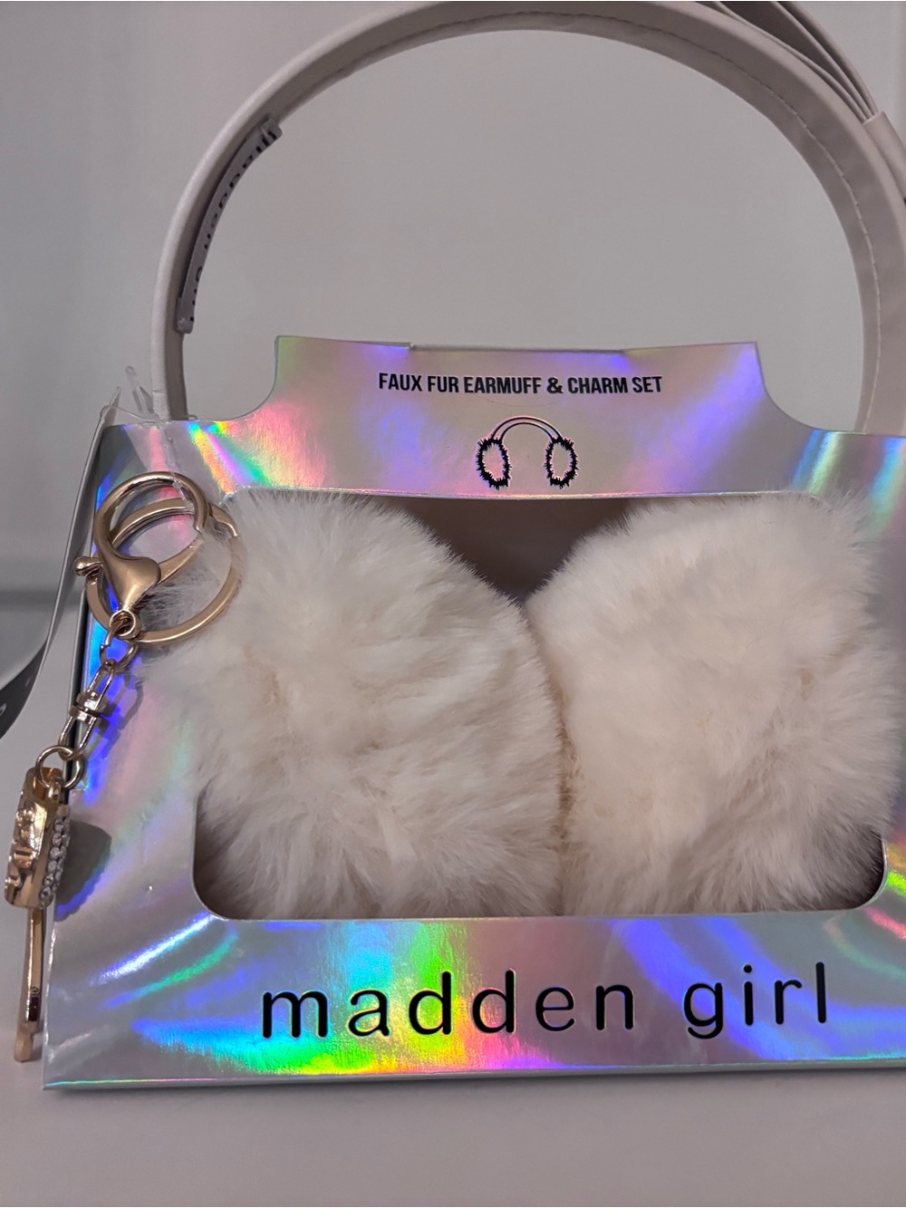 Madden Girl Plush Faux Fur Earmuffs with Charm - Cream